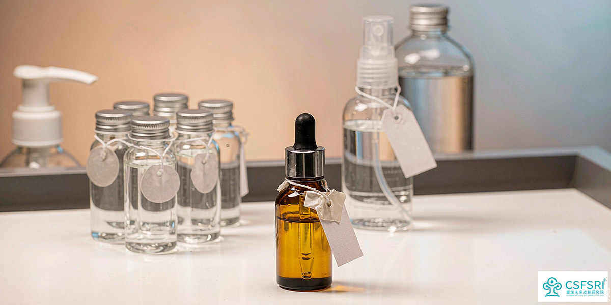 Sealed reference skincare samples in amber glass bottles on a laboratory bench